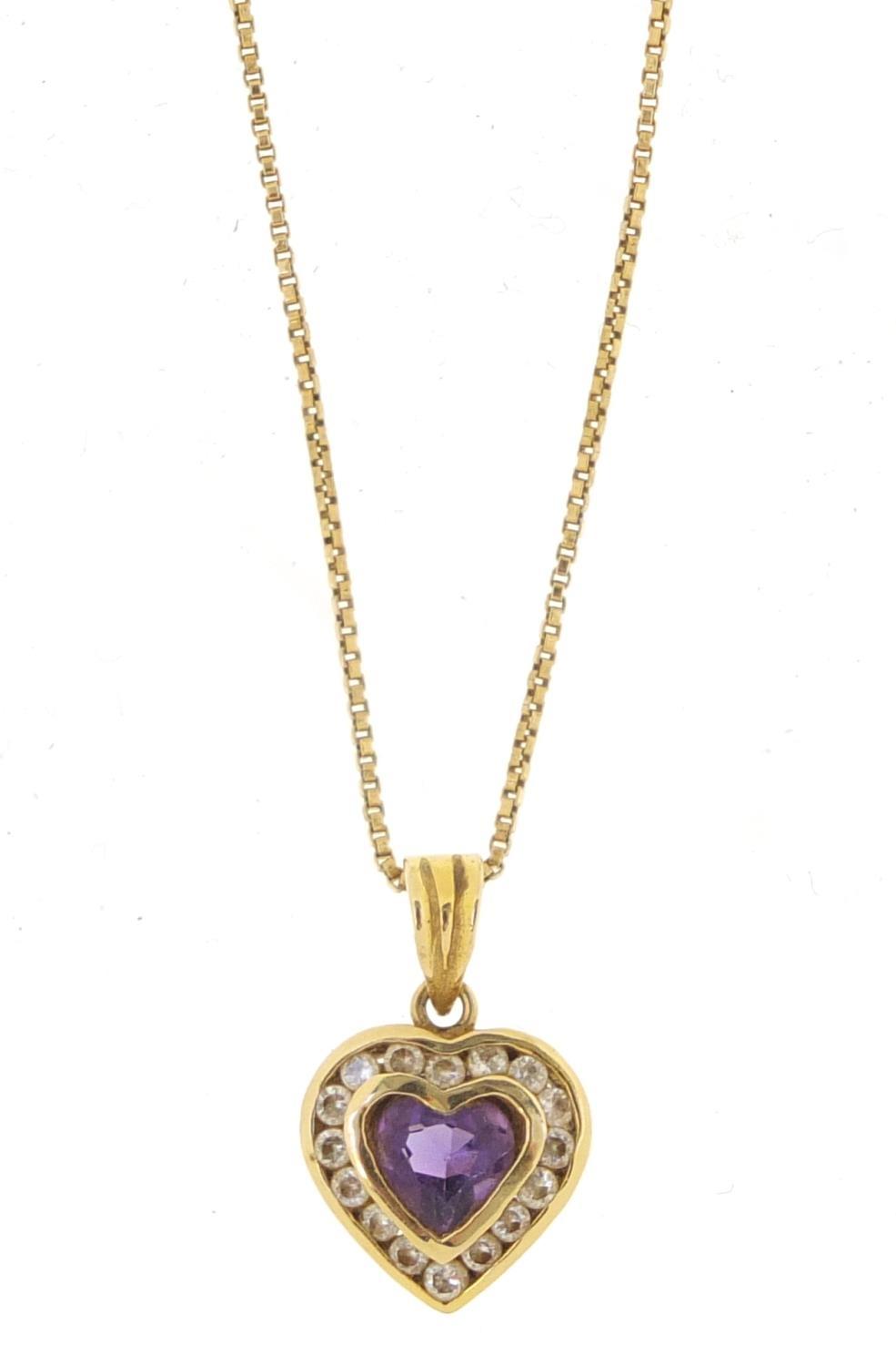 14ct gold amethyst and clear stone love heart pendant, 2cm in length on an unmarked gold coloured - Image 2 of 5