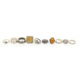 Ten silver rings, some set with stones including amber, various sizes, 43.5g : For Further Condition