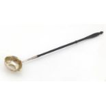 18th century unmarked silver toddy ladle with turned wood handle, the embossed bowl inset with a