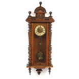Victorian walnut wall clock with face mask, 130cm high : For Further Condition Reports Please