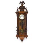 19th century walnut Vienna regulator wall clock by Gustav Becker with carved eagle and columns,