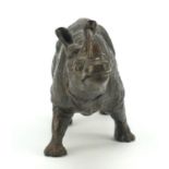 Bronze model of a standing rhinoceros, 30cm in length : For Further Condition Reports Please Visit