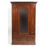 Victorian mahogany wardrobe with central mirrored door above a drawer, 198cm H x 122cm W x 55cm