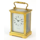 Brass cased carriage clock with enamelled dial having Roman numerals incscribed A.I The Equator,