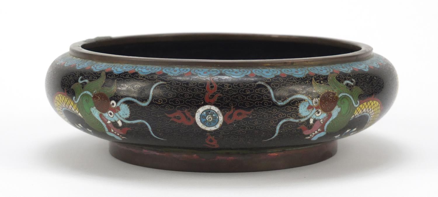 Chinese cloisonné squatted bowl enamelled with dragons amongst clouds, 20cm in diameter