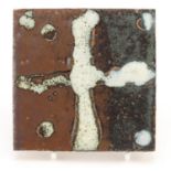 Attributed to Shoji Hamada, St Ives studio pottery tile hand painted with a stylised design,