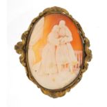 Large cameo brooch with gilt metal mount depicting an embracing couple, 7.5cm high, 31.2g