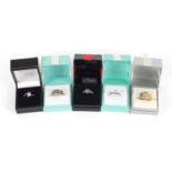 Five silver rings set with semi precious stones housed in gift boxes, various sizes, 19.8g