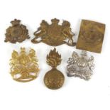 Victorian and later militaria including four military interest helmet plates and 72nd Own