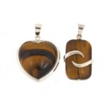 Two silver and tiger's eye pendants, each 4cm high, 19.5g