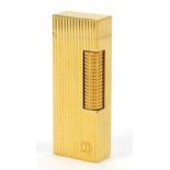 Dunhill gold plated pocket lighter with dust case and fitted box, 6.5cm high