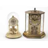 Two German anniversary clocks including one by Kundo, the largest 25.5cm high