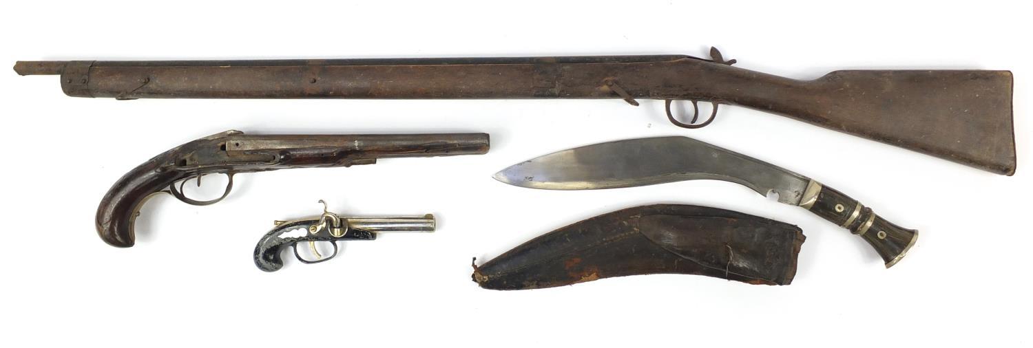 19th century double barrel pistol, Gurkha's kukri knife, percussion cap rifle and a gun design