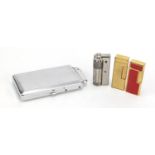 Vintage lighter cigarette case and three lighters including Dunhill and Cross with red enamel, the