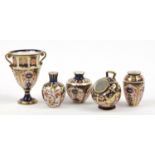 Royal Crown Derby Old Imari comprising a trophy vase, scuttle and three other vases, the largest