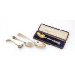 Four Georgian and later silver spoons including a silver gilt christening spoon, various