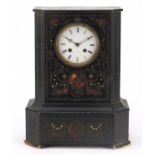 French ebonised mantle clock striking on a bell with foliate inlay having an enamelled dial with