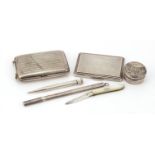 Silver objects including a rectangular cigarette case, propelling pencil, mother of pearl folding