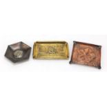 Three Arts & Crafts pin trays including a Celtic brass example embossed with a Viking longboat by