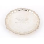 Goldsmiths and Silversmiths Co Ltd, silver salver raised on three ball and claw feet, Sheffield