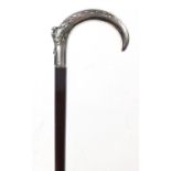 Snakewood walking stick with Continental silver handle, embossed with a winged eagle, impressed mark