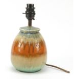 Ruskin pottery table lamp having a green and orange dripping glaze, dated 1932, 22.5cm high
