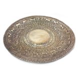 Burmese silver coloured metal tray embossed with birds of Paradise and wild animals amongst foliage,