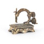 Medusa Oro, Italian miniature silver model of a Victorian sewing machine with moving parts, 4cm