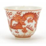 Good Chinese porcelain tea bowl, finely hand painted in iron red with two dragons chasing a