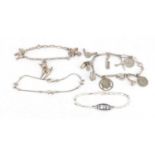 Four silver bracelets including two charm bracelets, 31.4g