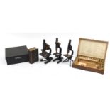 Scientific items including three microscopes and The Microscope leather bound hardback book