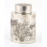 Dutch silver caddy embossed with a male serenading females within a landscape, impressed 800 to