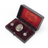 Victorian unmarked silver horseshoe brooch and earrings, housed in a fitted case - A present from
