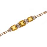 Unmarked gold orange and clear stone bracelet housed in a Bravington's box, 16cm in length, 16.0g