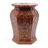 Burmantofts style brown glazed plant stand decorated with stylised flowers, 53cm high