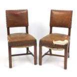 Pair of Victorian gothic chairs designed by Pugin with brown leather upholstery, each 90cm high