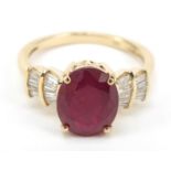 9ct gold ruby ring with diamond stepped shoulders, size Q, 4.4g