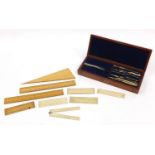 19th century mahogany cased drawing instrument set with five ivory rules, 34.5cm wide