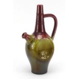 Linthorpe, Arts & Crafts pottery ewer having a red and green dripping glaze in the manner of