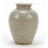 Chinese stoneware vase having a grey crackle glaze, inscribed paper label to the base, 11cm high