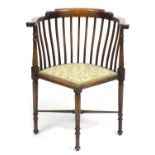 Edwardian mahogany corner chair with floral upholstered seat, 76cm high