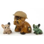 Rare military interest pottery Byngo dog, probably by Denby and two others, the largest 10cm high