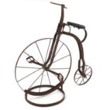 Antique shop display penny farthing on stand, 85cm high