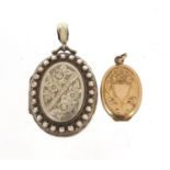 Victorian aesthetic silver coloured metal locket and a gold plated example, the largest 5.5cm
