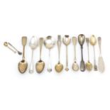 Twelve Georgian and later silver spoons and a cake knife, various hallmarks, the largest 14cm in