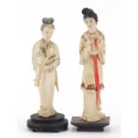 Two Chinese part stained ivory okimonos of Geishas raised on wood bases, 16cm high