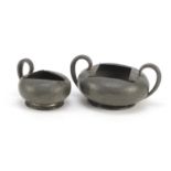 Archibald Knox for Liberty & Co, Arts & Crafts English pewter sugar bowl and milk jug, each numbered