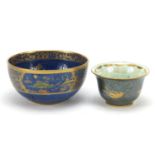 Wedgwood Fairyland luster bowl decorated with stylised birds and a Carlton Ware pagoda pattern bowl,