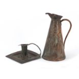 Arts & Crafts copper chamber stick and jug embossed with stylised flowers by Joseph Sankey, the