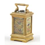Russian silver gilt miniature carriage clock with hand painted porcelain panels, with double